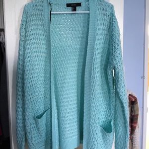 Light blue knitted cardigan